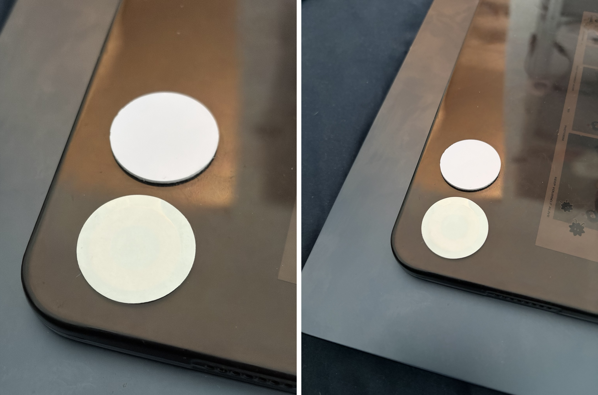 Two round sticker fobs attached to the back of an iPad